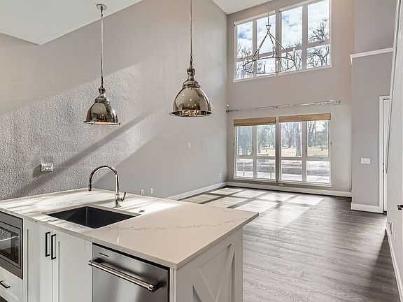 2-story entry way, electric/remote Hunter Douglas shades for all windows. Gorgeous views of Observatory Park