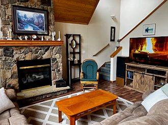 Living room with gas fireplace.