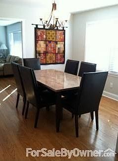 Dining Room
						:
						Solid wood floors throughout
Easy to clean, well maintained