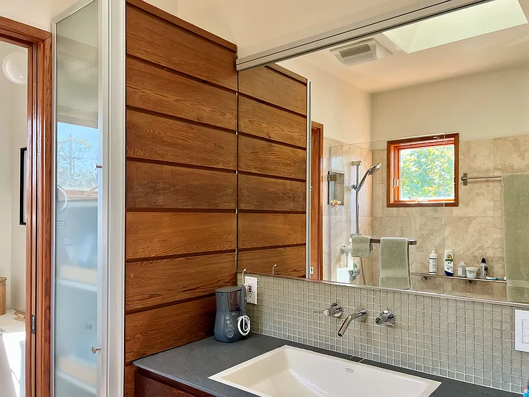 Primary Bathroom - vanity and linen cabinet