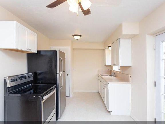 Kitchen offers new flooring, cabinets and countertop. Freshly painted and new light fixtures as well.