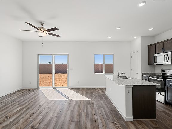 The living area is filled with natural lighting.