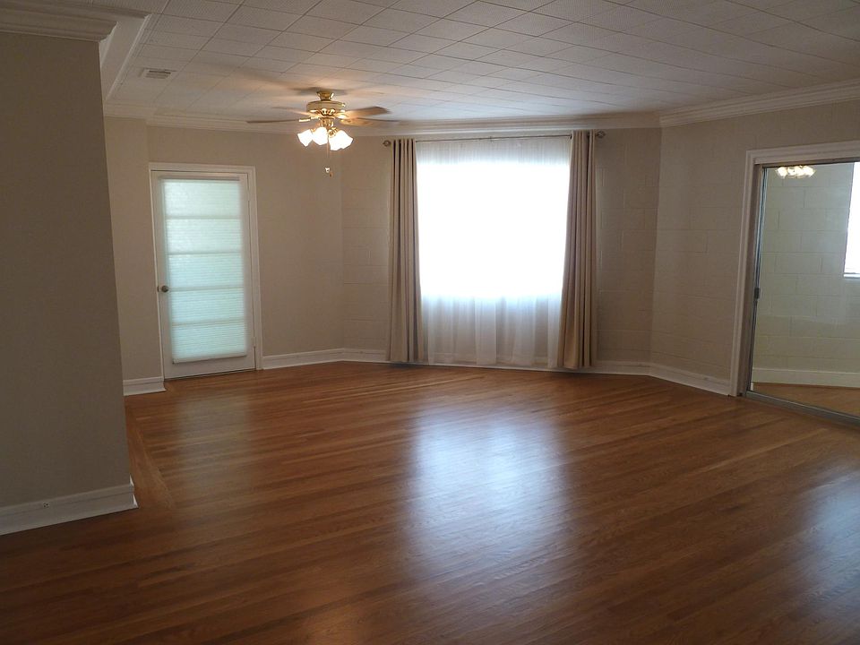 Spacious Living Room with Dining area & hardwood flooring