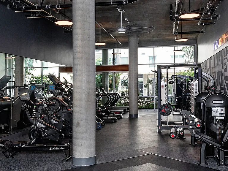 Apartment community 24-hour fitness center at Griffis East Village in San Diego, California.