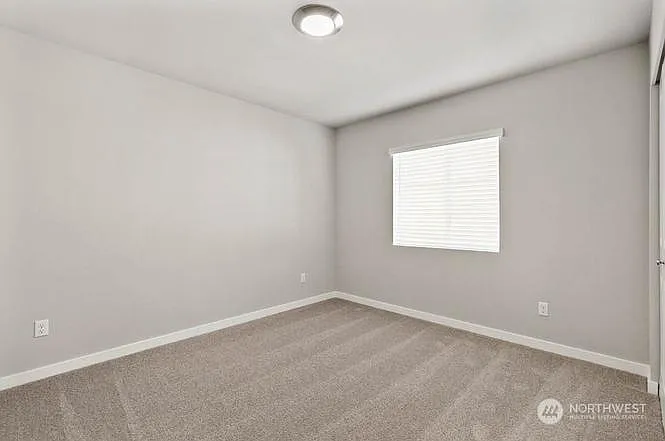 Fourth Bedroom with Backyard View