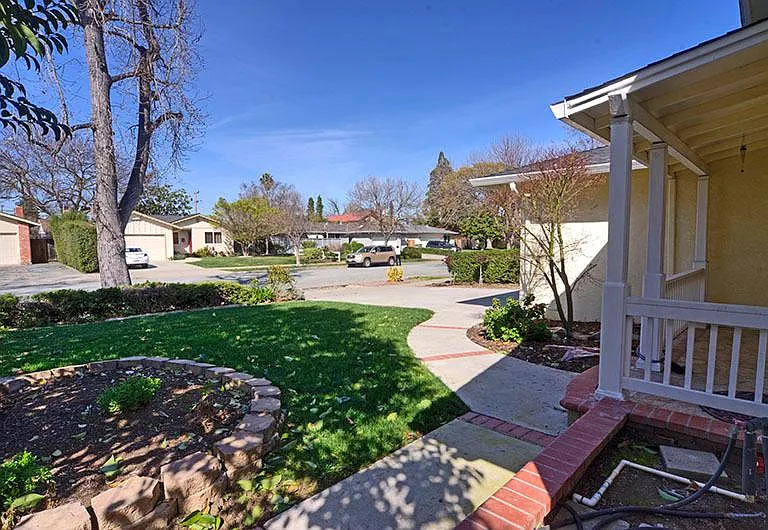 Front Yard: Owner pays for gardening service for yard maintenance
