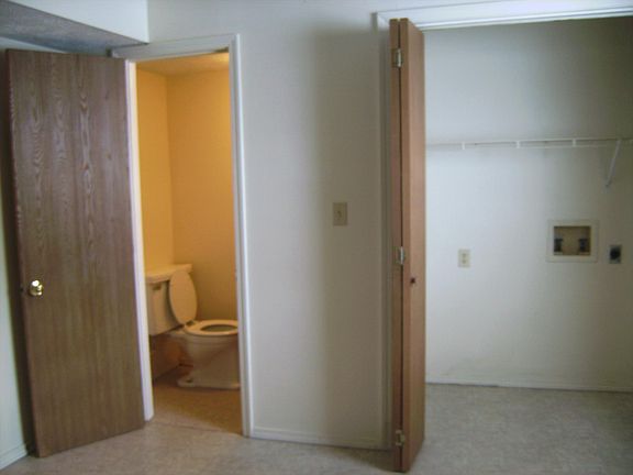 1/2 bath and laundry hookups in closet downstairs