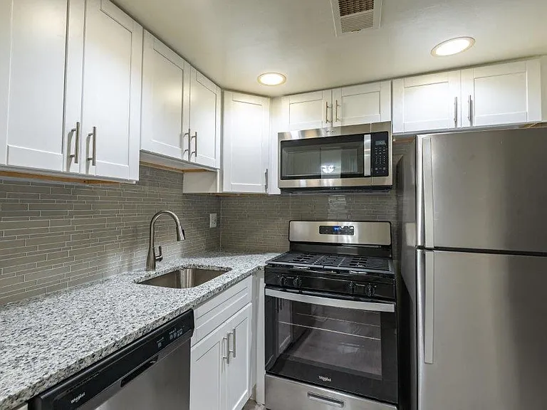 Village Square Apartments and Townhomes — Photo 4