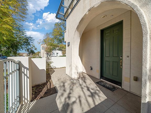 Charming private front courtyard entry.