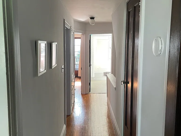 Second floor hallway after leaving the bedroom that is used as a workspace
