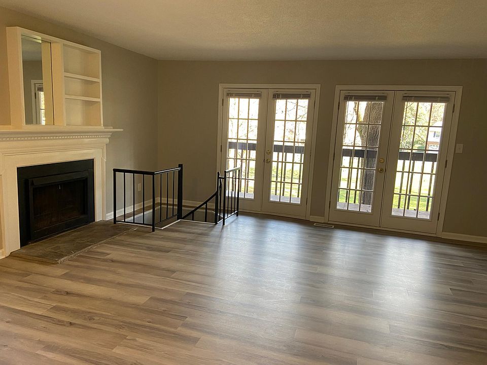 Gorgeous den with steps down to recreation area