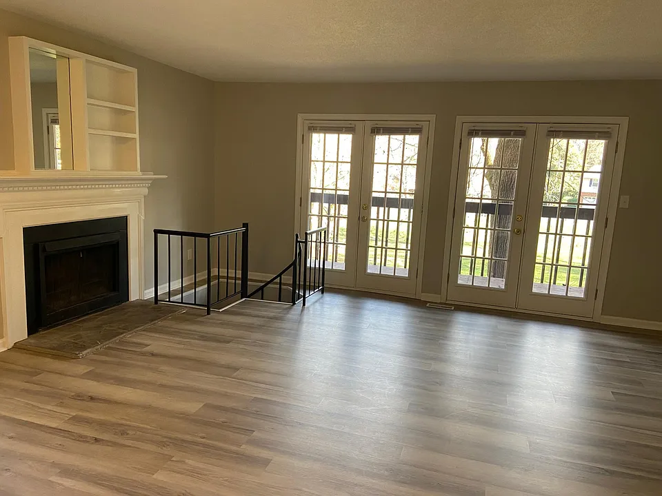 Gorgeous den with steps down to recreation area