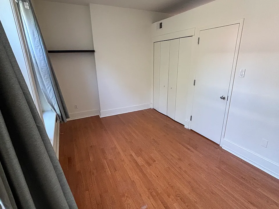 Large, spacious bedroom easily accommodates a king-size bed plus desk