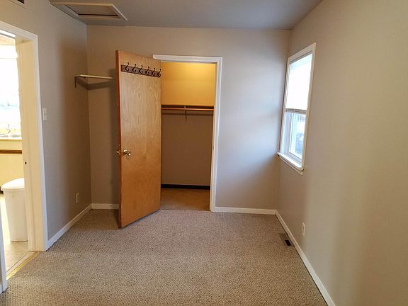 Bedroom with walk-in closet