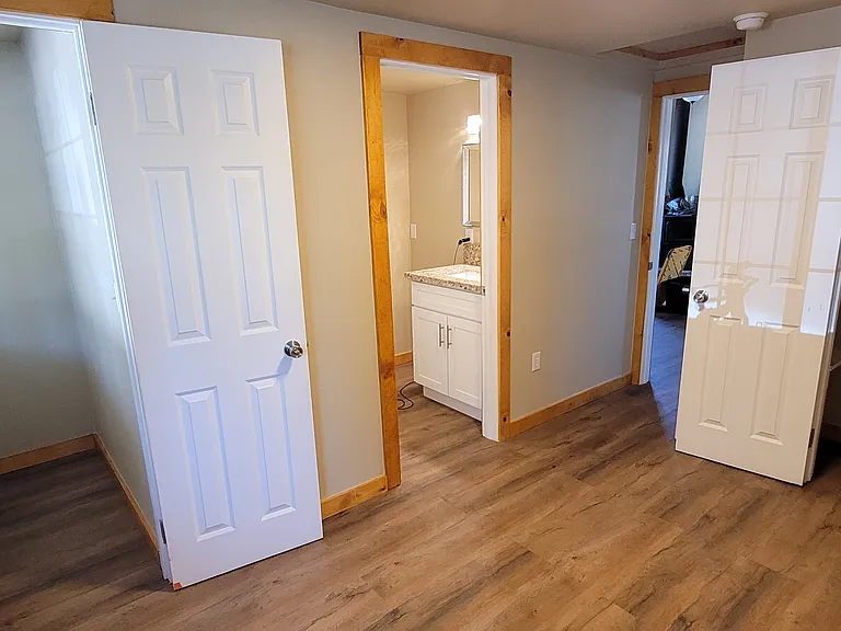 Master Bedroom with full bath, closet and extra storage area.