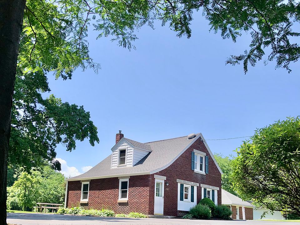 Front of home and parking area.