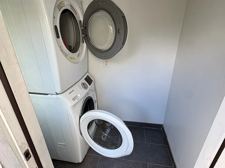 Private laundry room w/ storage space