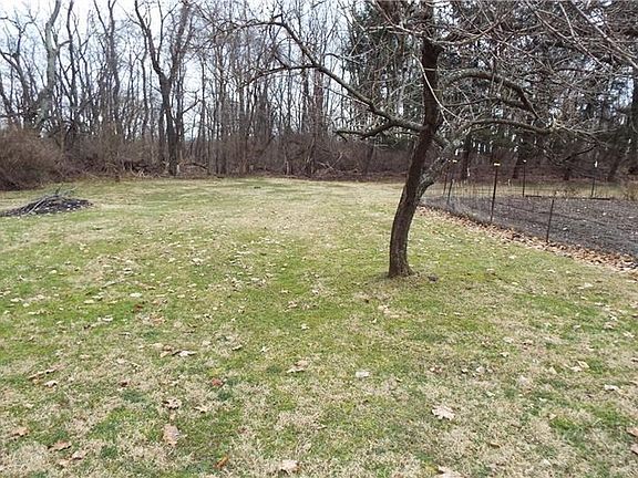 Large level lot above the rear of home.