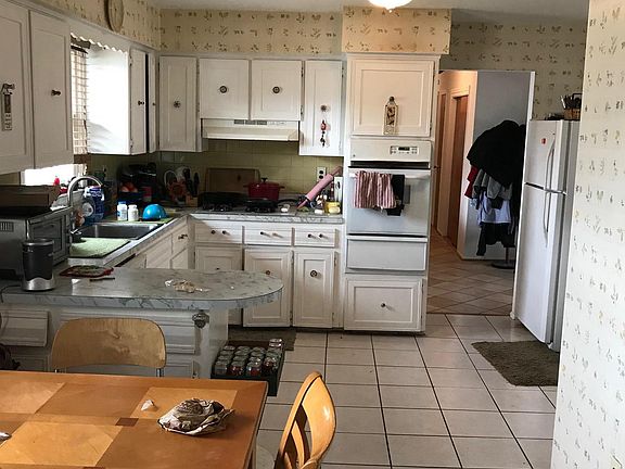 rear of kitchen looking towards front foyer