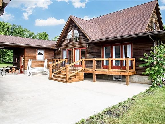~ Handsome Deck (Sikkens Sealed) & Large Concrete Space welcome you thru the Breezeway to the Garage Area. ~  Brand NEW Roof, Gu