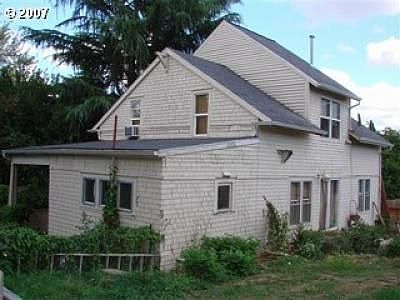 House on north side of lot.