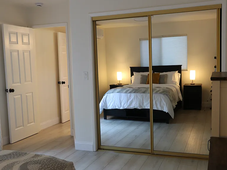 Master bedroom, view to the room entry.