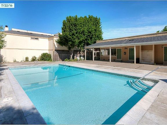 Pool area with clubhouse