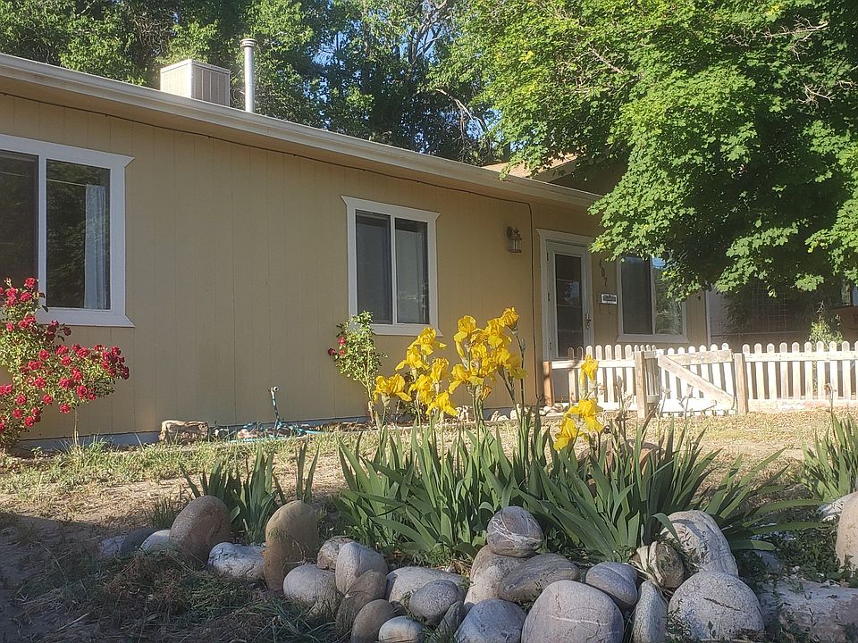 Fresh paint, new roof, and new gutters.