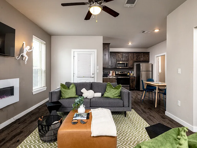 Cozy up by the fireplace and use the 50" Roku Smart TV for movie nights!