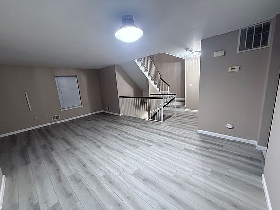 Living Rm, and staircase going to level 2 to Bedrooms