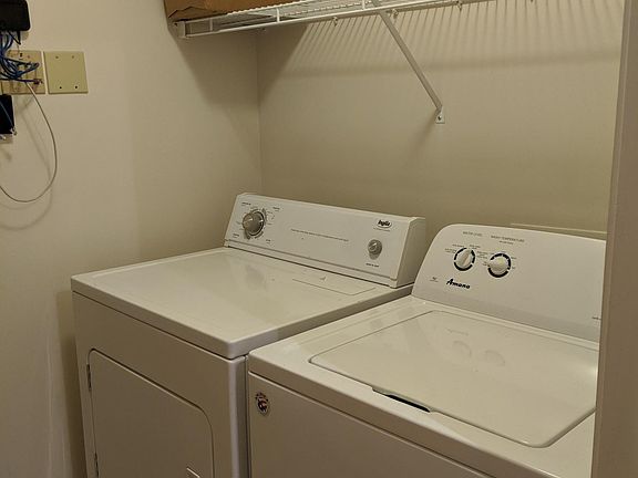 Washer and dryer in laundry room off kitchen