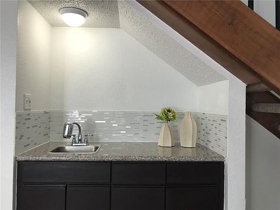 Wet bar just outside the kitchen