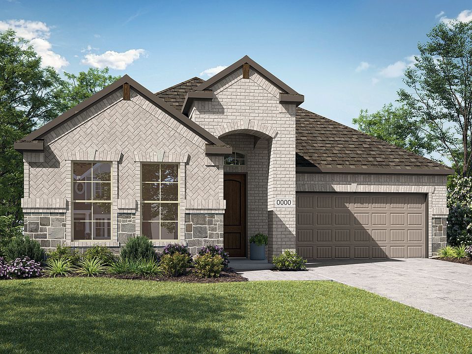 A two-story house with a stone and siding exterior, a tiled roof, and a well-manicured lawn surround
