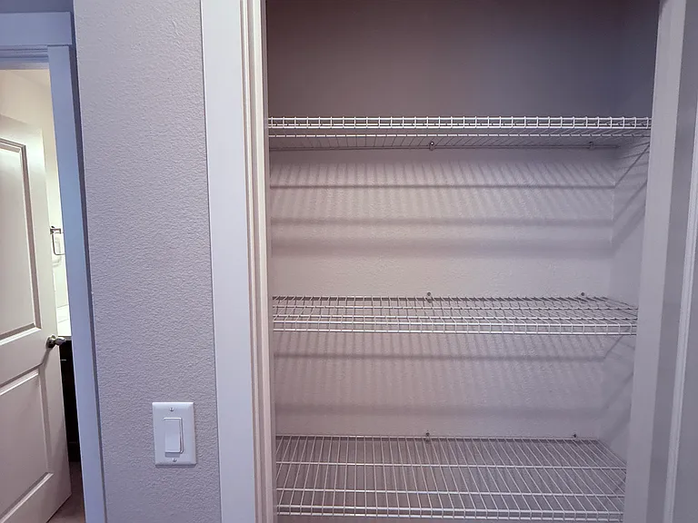 Hall closet/linen closet.