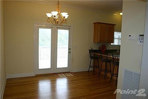 Spacious kitchen with eat-in, woodflooring & door opening to deck!