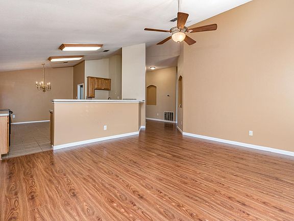 Perfect for entertaining family and friends, the living area is open to the kitchen.