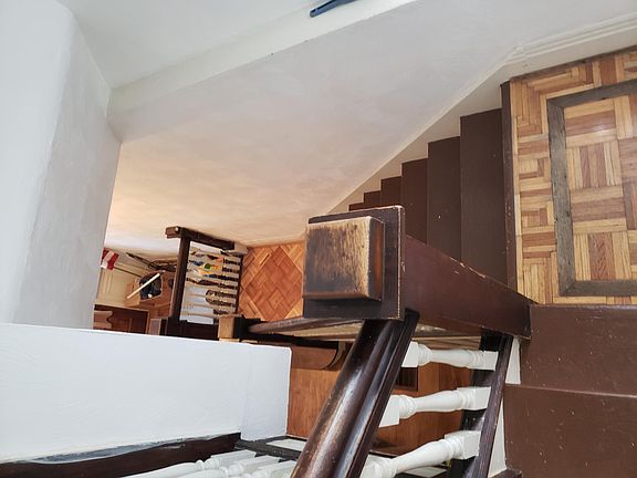 Photo taken of the stairs from 2nd floor going to the first floor - spacious home in Blawnox- 15238