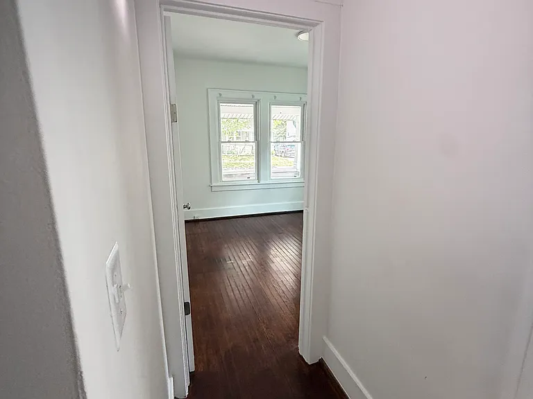 Hallway to front bedroom.