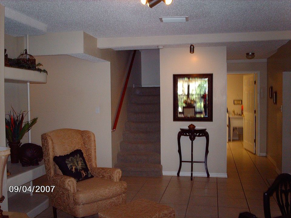 Living Room w/view to Upstairs apartment