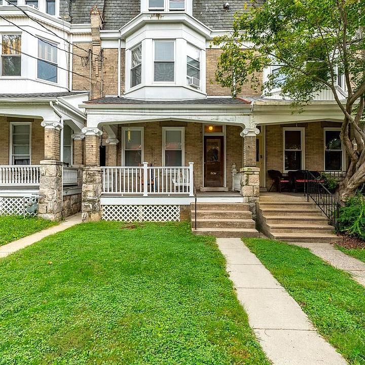 Relax at the porch cafe table with a friend and a glass of lemonade while enjoying the cozy flicker of the beautiful porch pendant. Boston ferns will soon grace the front porch.