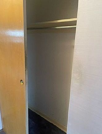 upstairs primary bedroom closet