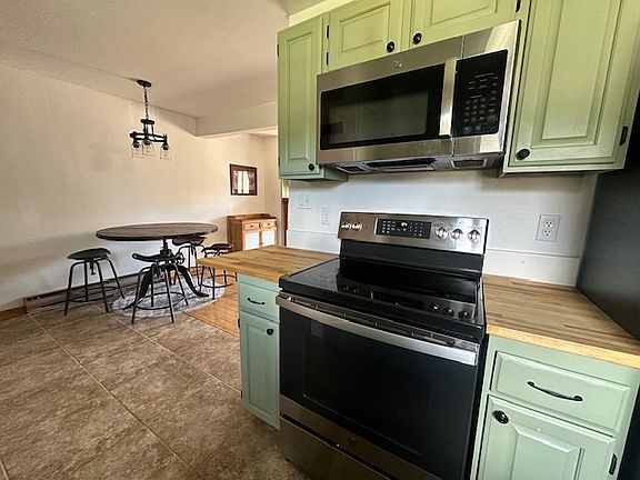 Stainless steel appliances in kitchen