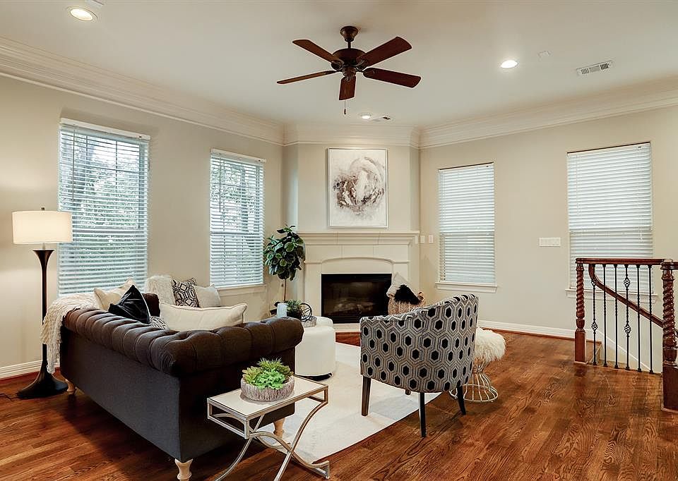 High ceilings, crown molding and beautiful fireplace!