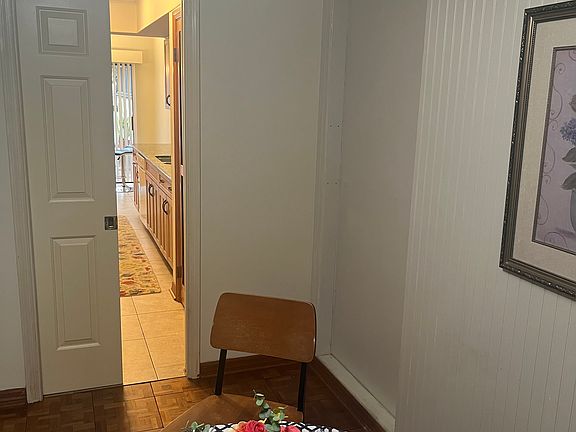 Dining room view to kitchen, pocket doors close off kitchen and breakfast nook.