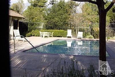 Stroll down the greenbelt to the community pool and spa. While relaxing in the