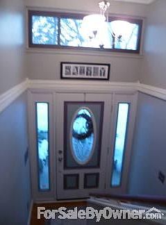 Front entry
						:
						Custom wrap-around crown moulding