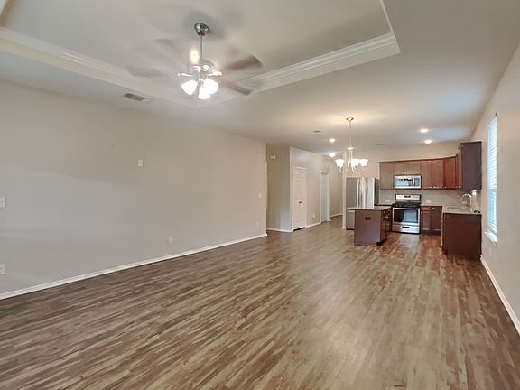 Spacious living room with neut