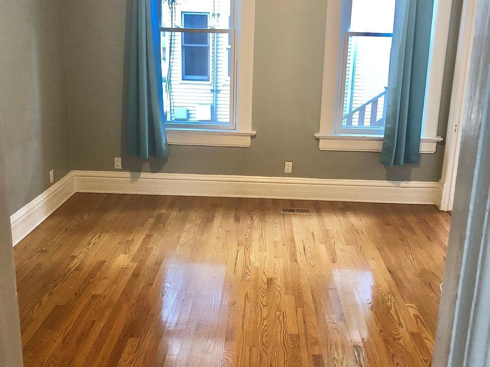 Living room from kitchen, not floor to ceiling windows, new as of 2017