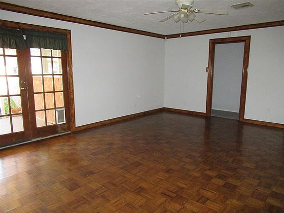 Formal Dining Room or Game Room. Large Open Rooms.