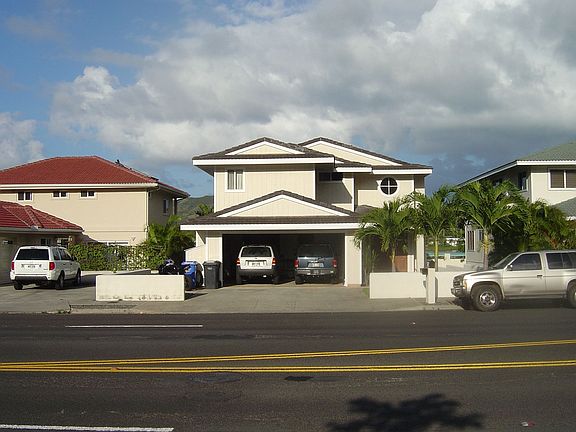 Two Car Garage with Extra Storage Inside and Out